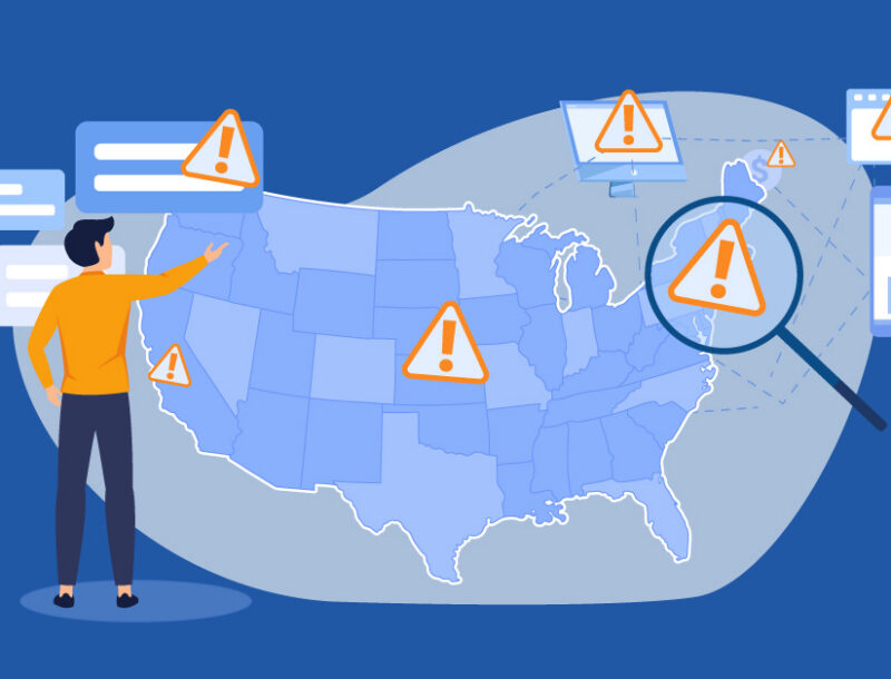 Person pointing to a blue United States map filled with orange warning triangles and floating data panels